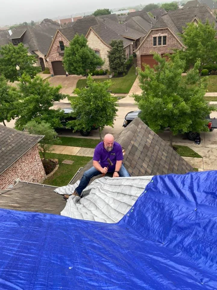 Roofing crew at work on residential project